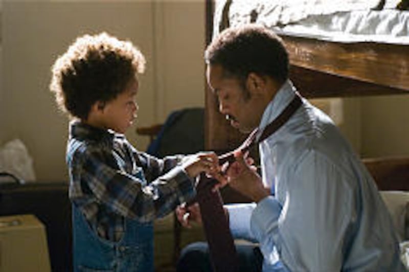 Jaden Christopher Syre Smith, left, and Will Smith star in the drama "The Pursuit of Happyness."