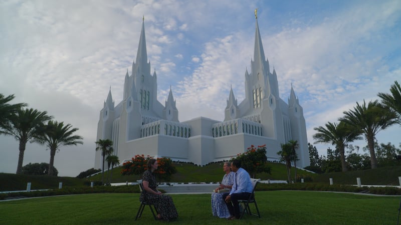 Elizabeth and Giovanni Guanuna speak to Church News reporter Aimee Cobabe on the grounds of the San Diego California temple on Saturday, Aug. 22, 2026.