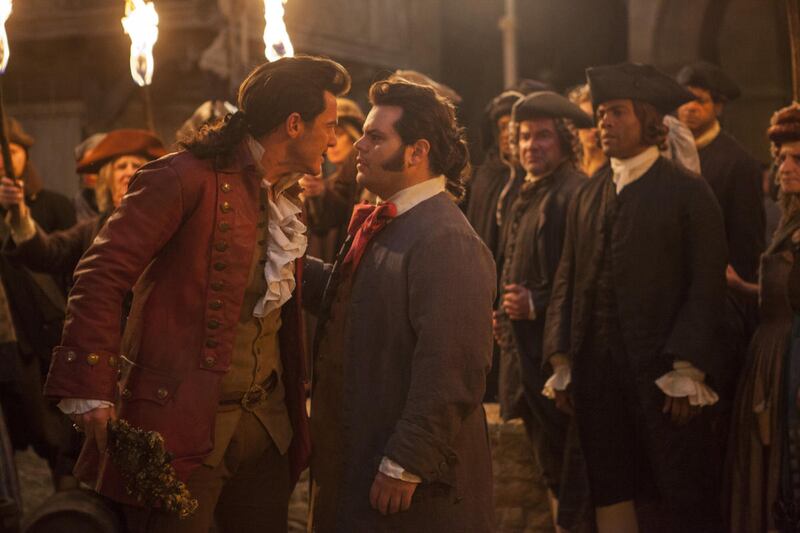 Luke Evans is Gaston and Josh Gad is LeFou, in Disney's "Beauty and the Beast," a live-action adaptation of the studio's animated classic, directed by Bill Condon.