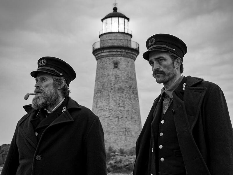 This image released by A24 Films shows Willem Dafoe, left, and Robert Pattinson in a scene from “The Lighthouse.” A24 is auctioning off props from their critically acclaimed films to raise money for COVID-19 relief.
