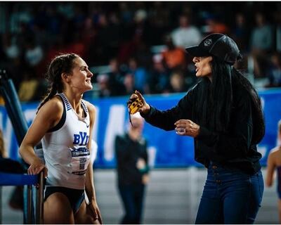 BYU athlete Erica Birk-Jarvis confers with coach Diljeet Taylor during a recent indoor track meet. Birk-Jarvis and other BYU seniors have to decide whether they will return to school for an additional year of eligibility after their season was canceled due to the COVID-19 outbreak.