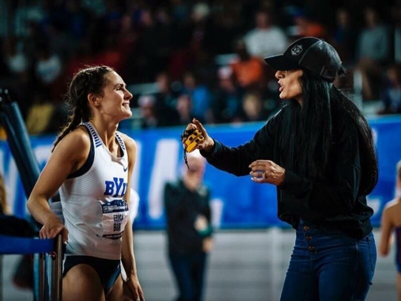 BYU athlete Erica Birk-Jarvis confers with coach Diljeet Taylor during a recent indoor track meet. Birk-Jarvis and other BYU seniors have to decide whether they will return to school for an additional year of eligibility after their season was canceled due to the COVID-19 outbreak.