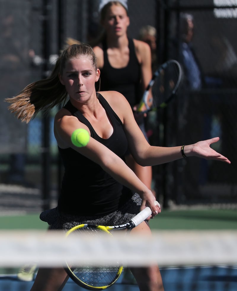 Lone Peak's Katie King competes in and wins the first doubles championship match with Cami Gricius, not pictured, against Davis High during the 6A state tennis tournament at the Liberty Park Tennis Center in Salt Lake City, on Friday, Oct. 6, 2017.