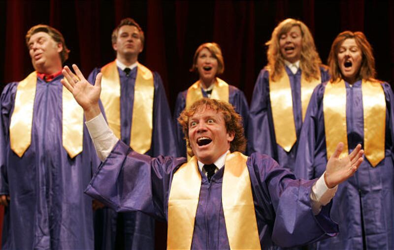 Cragun Foulger, center, sings with the cast of "Saturday's Voyeur." Salt Lake Acting Company has produced the show for 30 years.