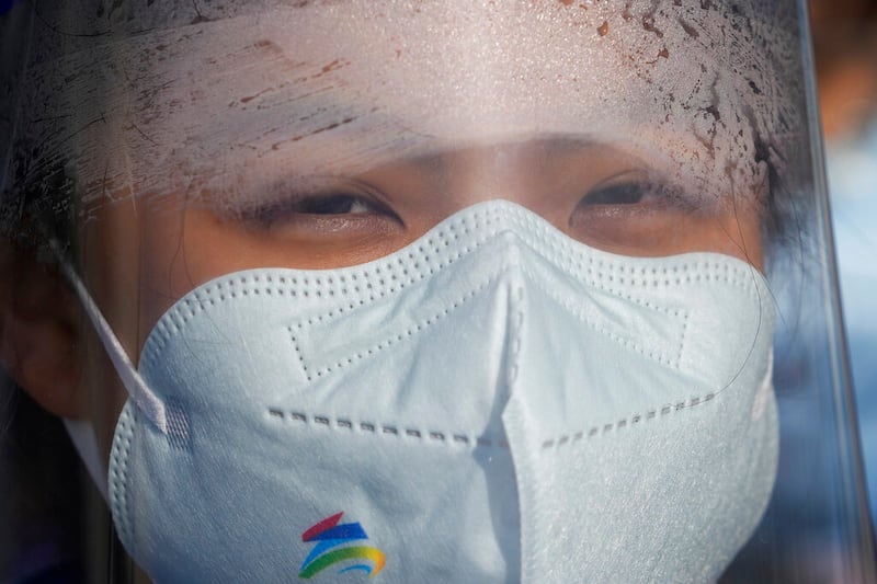 A volunteer in the Yanqing district of Beijing.