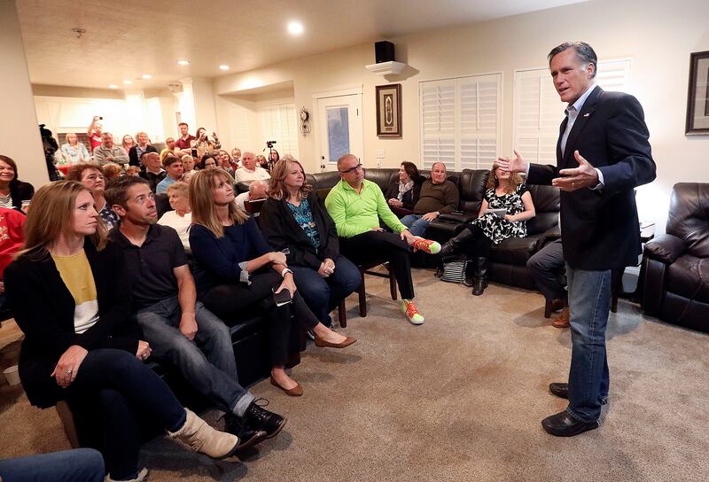 U.S. Senate candidate Mitt Romney visits with voters at the home of Calvin Musselman, Republican candidate for District 9 of the Utah House of Representatives, in West Haven on Monday, Oct. 8, 2018.