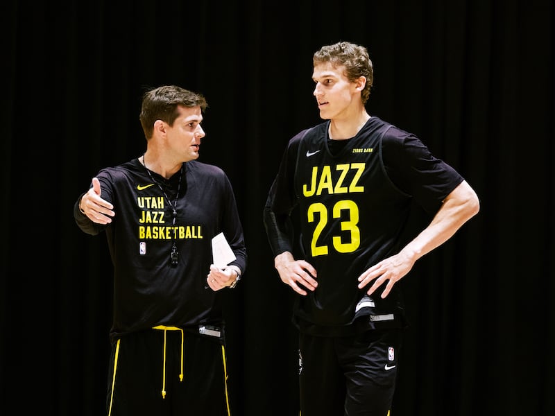Utah Jazz coach Will Hardy, left, talks with Lauri Markkanen during training cam in Hawaii this week.