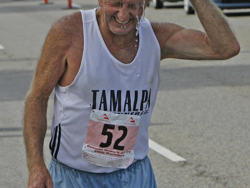 FIILE - Darryl Beardall cools off at the 40th Deseret News marathon Friday, July 24, 2009, in Salt Lake City, Utah.