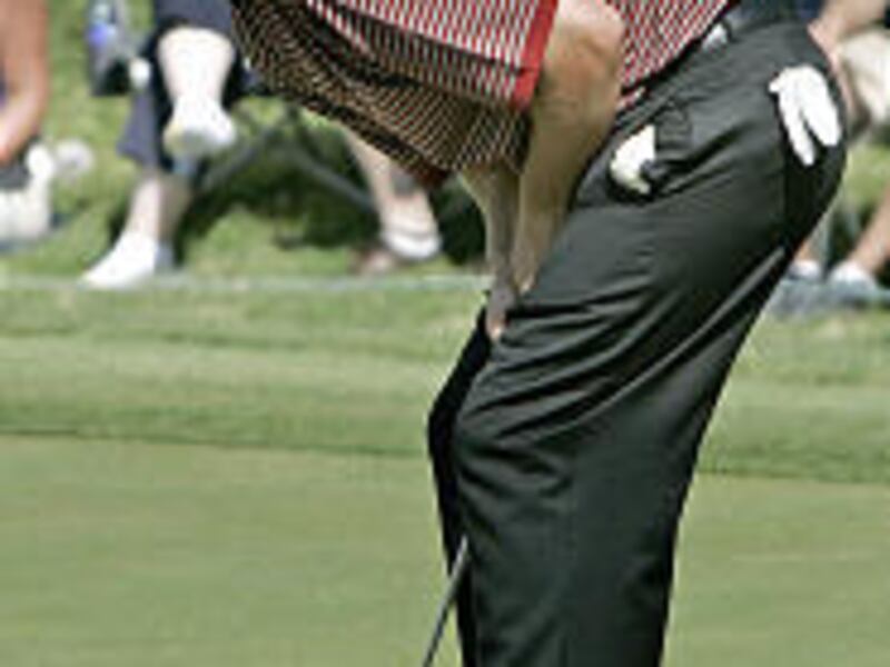 Brett Wetterich watches as his putt just misses the hole during final round play at the Byron Nelson Championship in Texas.