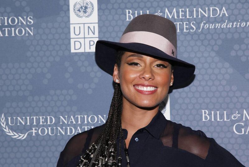Singer, songwriter and humanitarian, Alicia Keys smiles for a photo backstage at the fifth annual Social Good Summit: Connecting for Good, Connecting for All, a convening of world leaders, new media and technology experts, grassroots activists, and voices