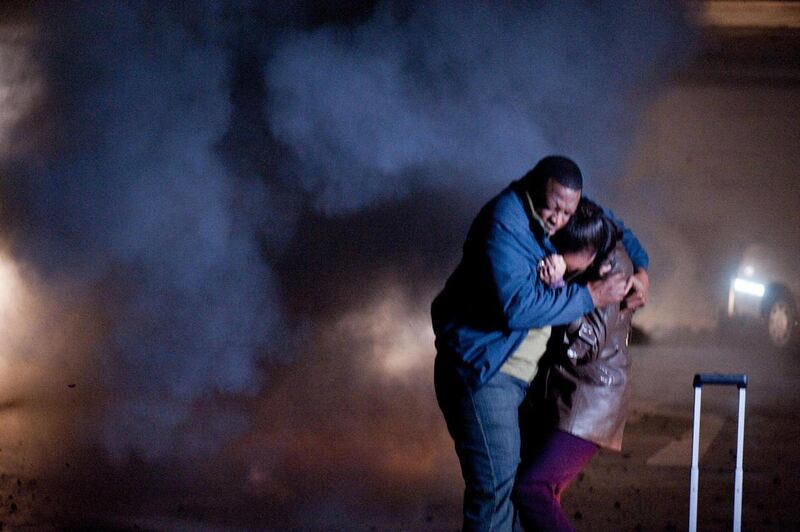 This image released by Warner Premiere shows Melvin Abston as Lee Martin, left, and Nikki Crawford as Julie Martin in a scene from the new sci-fi series called "H+ The Digital Series." Made with a budget of just under $2 million, the 48-part series by fi