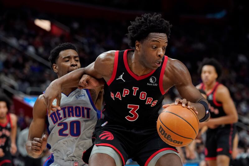 Toronto Raptors forward OG Anunoby (3) grabs a rebound next to Detroit Pistons guard Josh Jackson (20) during an NBA basketball game,