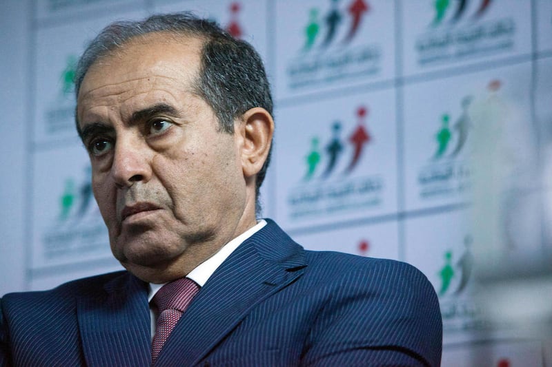 FILE - In this July 8, 2012 file photo, Mahmoud Jibril speaks to the media during a presser at National Forces Allies head quarter in Tripoli, Libya. Final Libyan election results show a secular, liberal alliance in first place in the nation's first free