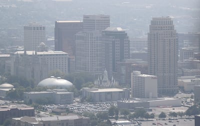 Smoke from wildfires shrouds the Salt Lake City skyline on Thursday, Aug. 9, 2018.