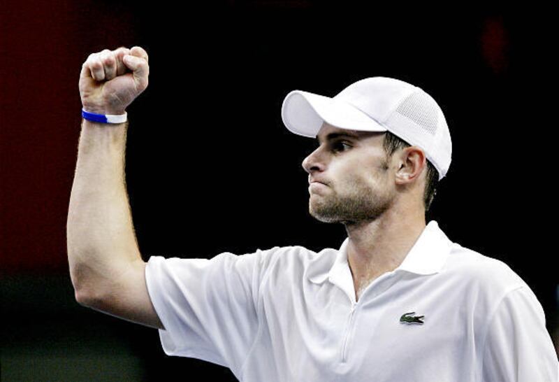 Andy Roddick celebrates winning a point against Sweden's Jonas Bjorkman during Sunday's semifinal match.