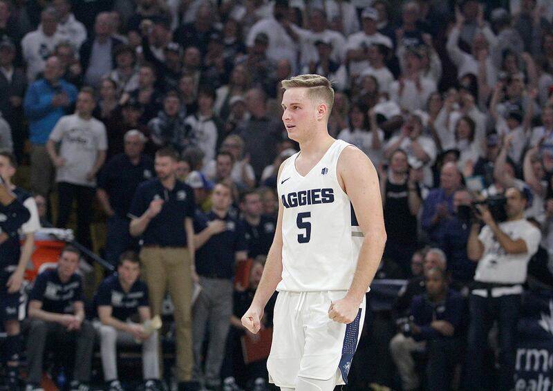 Utah State guard Sam Merrill walks back up the court at the Smith Spectrum following one of the final plays of the Aggies’ upset of No. 12 Nevada on Saturday, March 2, 2019, in Logan.