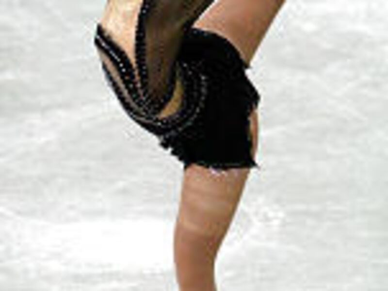 Japan's Shizuka Arakawa performs Saturday during World Figure Skating Championships.