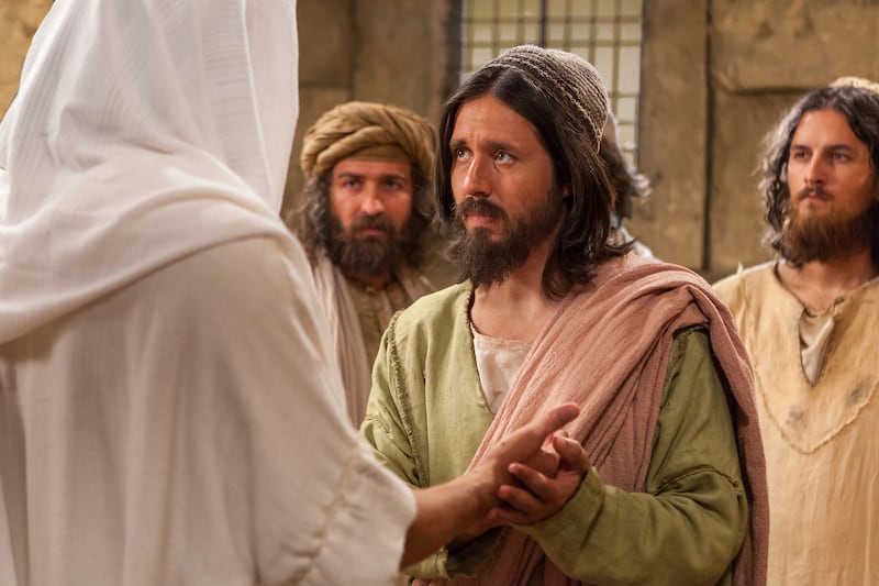 Jesus Christ approaches Thomas after Thomas declares that he will not believe unless he sees him in this image from the Bible Videos series.