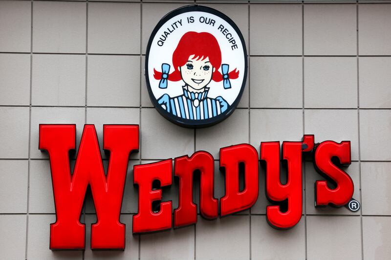 FILE- This Feb. 23, 2018, file photo shows a Wendy’s restaurant in Pittsburgh. Wendy’s Co. on Thursday, Feb. 21, 2019 reported fourth-quarter net income of $18.8 million. On a per-share basis, the Dublin, Ohio-based company said it had net income of 8 cen