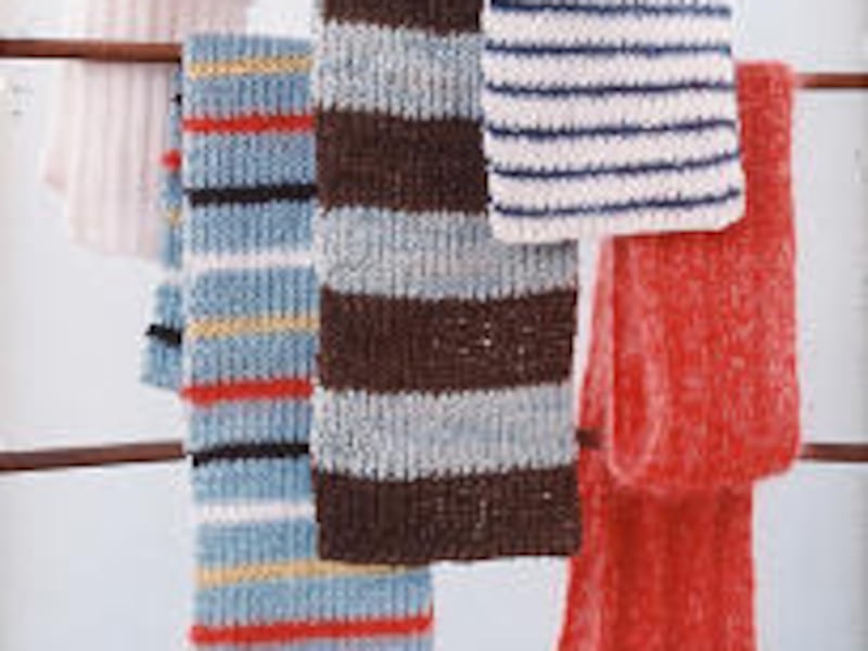 Blocking hand-knitted scarves smooths the seams and gives them a professional look. Adding a decorative edge also helps prevent curling.