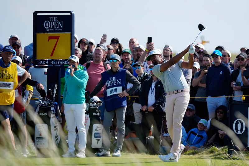 Tony Finau plays his tee shot off the seventh tee on the first day of the British Open at the Royal Liverpool Golf Club in Hoylake, England, Thursday, July 20, 2023. The Utah golfer is across the pond this week to compete in the Open Championship at Scotland's Royal Troon Golf Club.