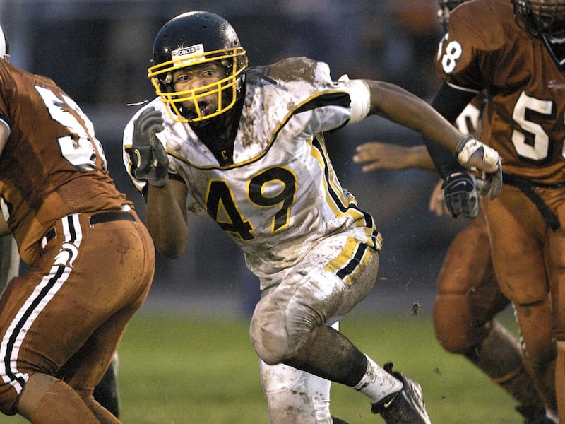 Cottonwood High School Linebacker Lynn Katoa plays in a game against Murray last season. Michelle Cate for The Deseret Morning News