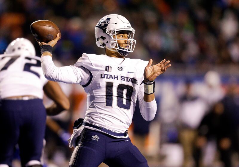 Utah State quarterback Jordan Love (10) looks to throw the ball against Boise State in the second of an NCAA college football game, Saturday, Nov. 24, 2018, in Boise, Idaho. Boise State won 33-24. (AP Photo/Steve Conner)