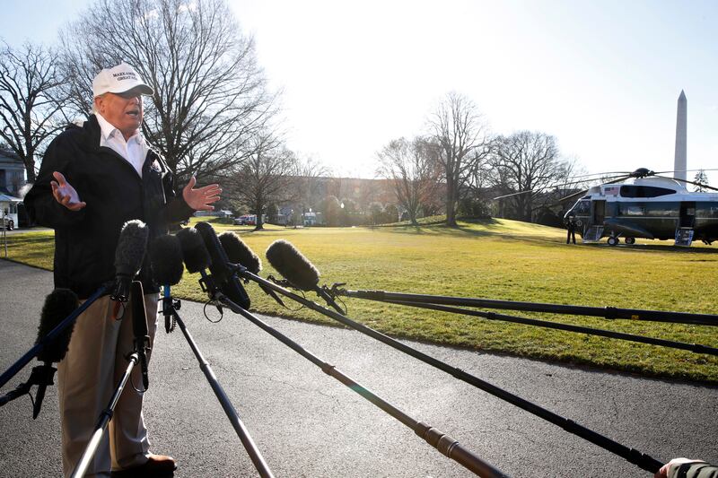 President Donald Trump speaks to the media as he leaves the White House, Thursday Jan. 10, 2019, in Washington, en route to the border in Texas as the government shutdown continues.
