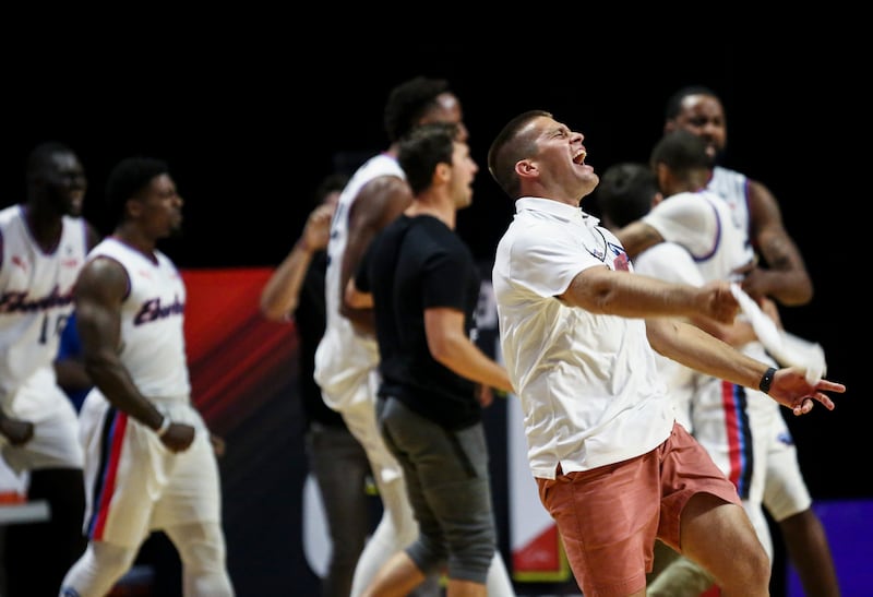 FILE: An Eberlein Drive staff member celebrates after the team wins game one to advance to the next round in The Basketball Tournament at the Maverick Center in West Valley City on Thursday, July 25, 2019.