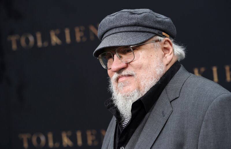 Author George R.R. Martin poses at the premiere of the film “Tolkien,” at the Regency Village Theatre on May 8, 2019, in Los Angeles. Martin is among 17 authors suing OpenAI for copyright infringement.