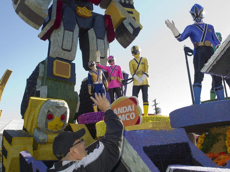 In this photo provided by NAMCO BANDAI Games America Inc., Power Rangers practice their choreography on the NAMCO BANDAI Games America, Inc. Rose Parade float, Sunday, Jan. 1, 2012, in Azusa, Calif. The float, featuring Saban's Power Rangers Samurai, will