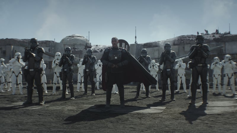 Moff Gideon (Giancarlo Esposito) with stormtroopers and death troopers in “The Mandalorian.”