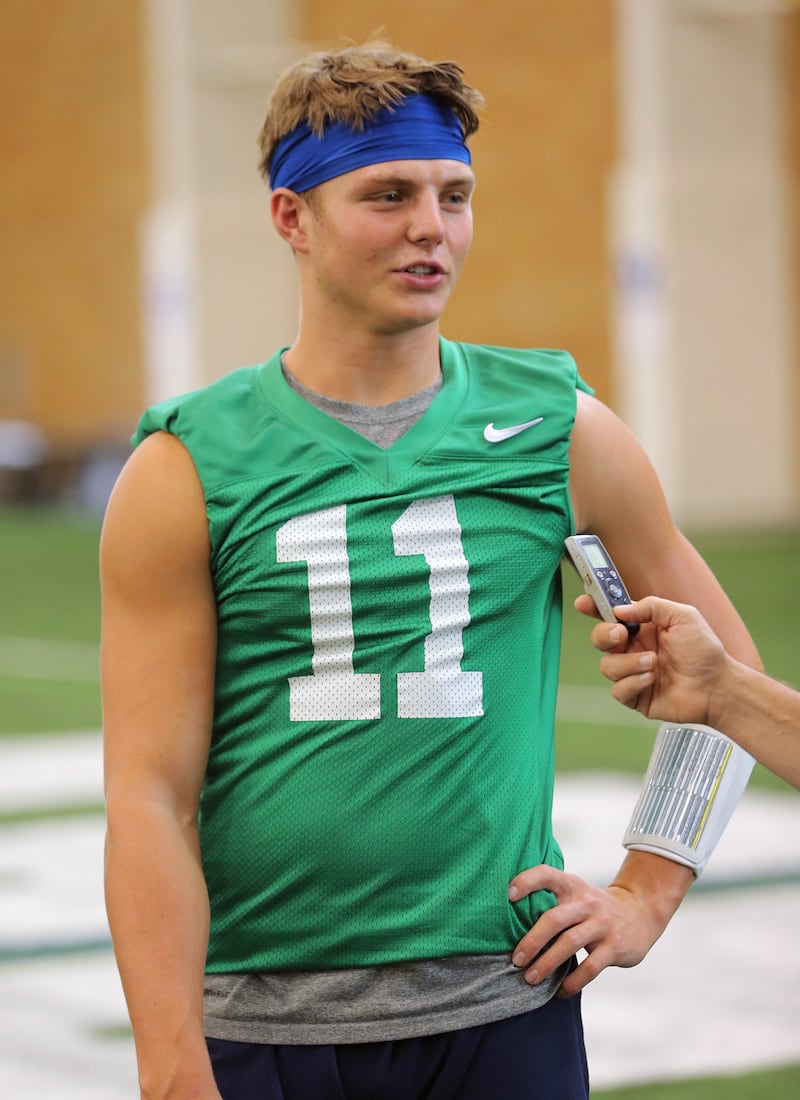 BYU quarterback Zach Wilson talks with media after a walkthrough in their indoor practice facility in Provo on Friday, Aug. 10, 2018.
