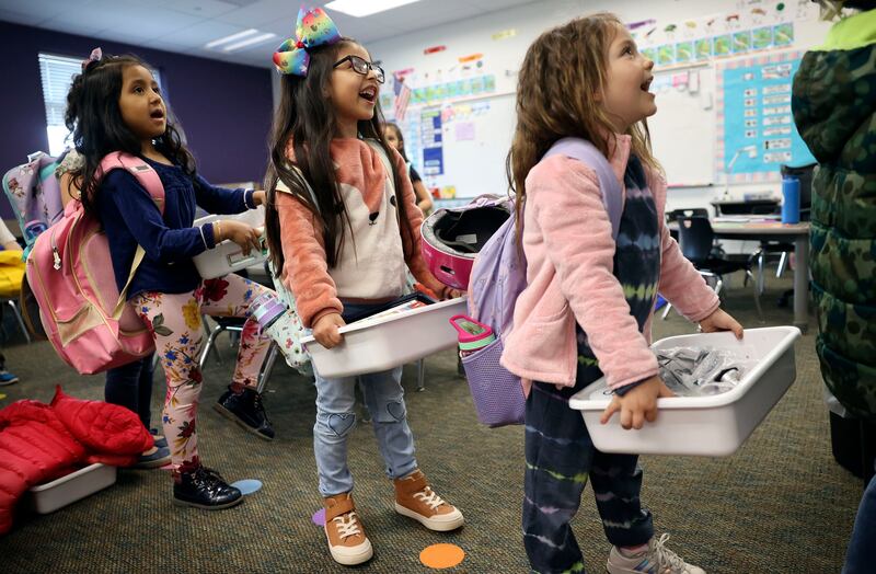 Kindergarteners wait to change classrooms at Daniels Canyon Elementary School in Heber City.