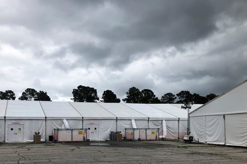 In this May 27, 2020 file photo, quarantine tents set up for recruits arriving at the Marine Corps’ Parris Island Recruit Depot, S.C. The tents were used until earlier in the week and now recruits go through quarantine at the Citadel, the Marine college in Charleston, S.C.