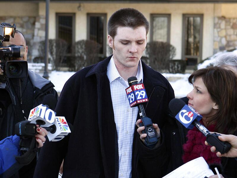 FILE - In this file photo from Feb. 16, 2007, Garrett Reid, the oldest son of Philadelphia Eagles head coach Andy Reid, leaves the Plymouth Township police station in Plymouth Meeting, Pa., after surrendering to police for 14 misdemeanor and summary offen