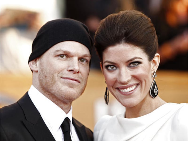 Actors Michael C. Hall, left, and wife Jennifer Carpenter arrive at the 16th Annual Screen Actors Guild Awards in Los Angeles.