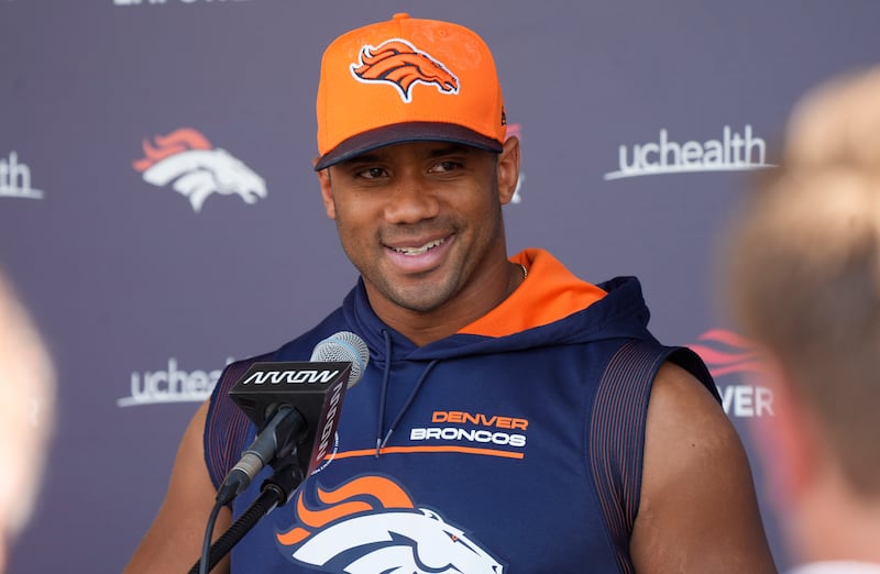 Denver Broncos quarterback Russell Wilson responds to a question during a news conference before practice Thursday, Sept. 8, 2022.