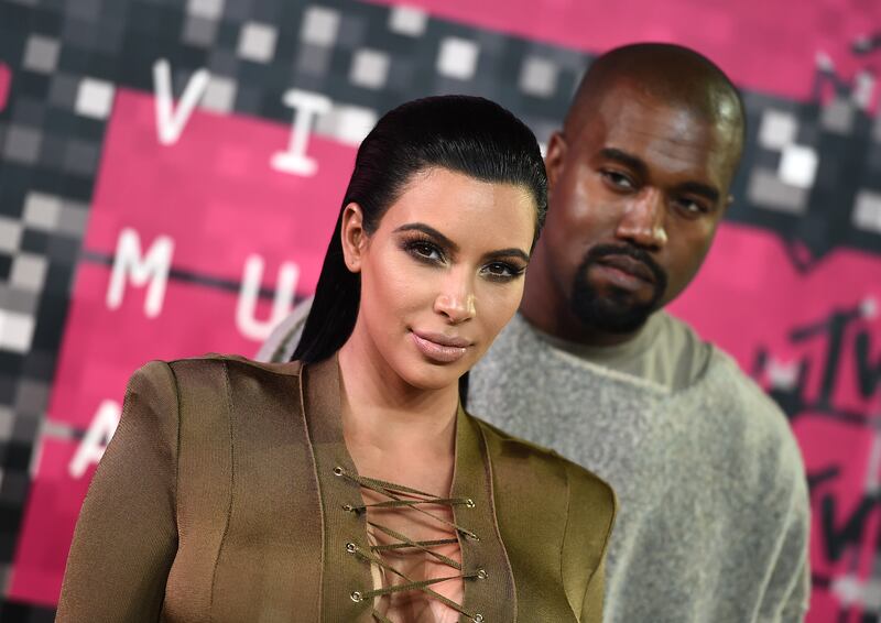 Kim Kardashian, left, and Kanye West arrive at the MTV Video Music Awards at the Microsoft Theater on Sunday, Aug. 30, 2015, in Los Angeles.