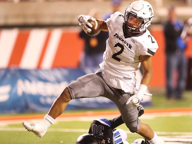 Desert Hills' Nephi Sewell (2) scores against Stansbury during the 3AA semifinal high school football game in Salt Lake City on Thursday, Nov. 10, 2016. Desert Hills won 49-14.