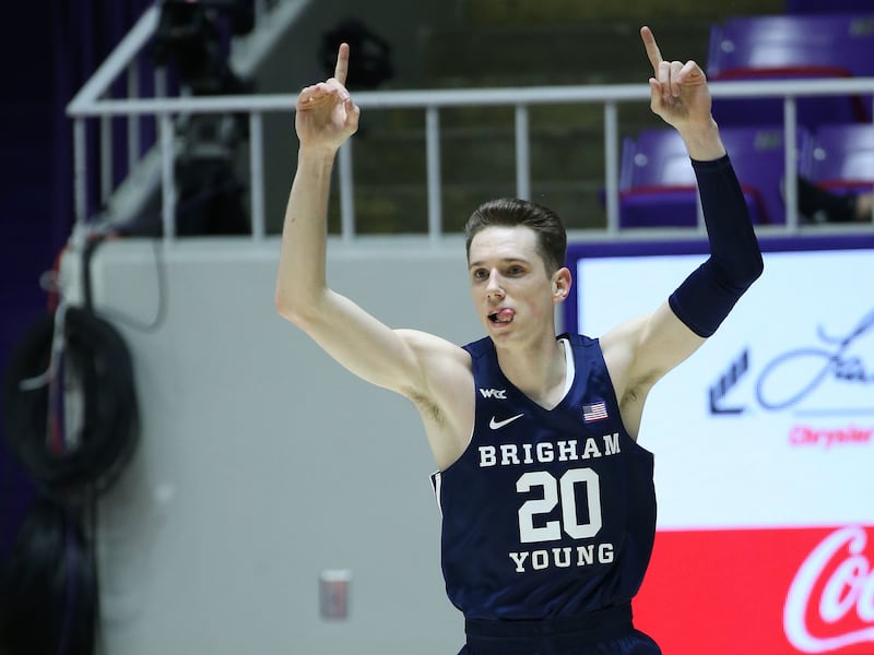 Brigham Young Cougars guard Spencer Johnson celebrates a basket.