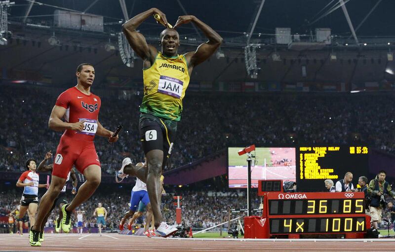 Jamaica's Usain Bolt celebrates his win in the men's 4 x 100-meter relay final during the athletics in the Olympic Stadium at the 2012 Summer Olympics, London, Saturday, Aug. 11, 2012. Jamaica set a new world record with a time of 36.84 seconds.