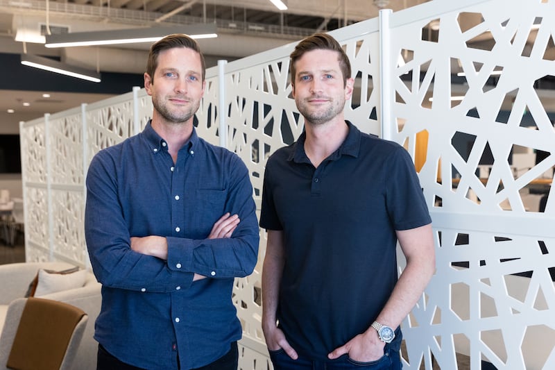 Eric, left, and Greg Levesque, founders of Utah-based tech startup Strider Technologies, pose for a portrait in South Jordan on Aug. 14, 2023.