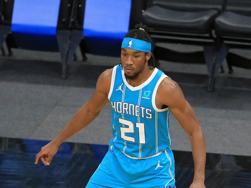 Xavier Sneed, who currently plays for the Greensboro Swarm of the NBA G League, is signing a two-way deal with the Utah Jazz.