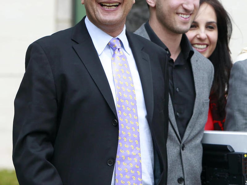 MGA chief executive Isaac Larian, left smiles after a victory over Mattel Inc. outside of federal court in Santa Ana, Calif. on Thursday, April 21, 2011. Mattel alleged that Bratz designer Carter Bryant created the billion-dollar Bratz line while employ