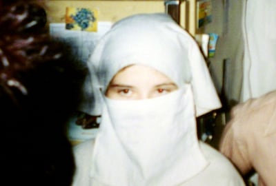 Elizabeth Smart is seen wearing a veil at a party in Salt Lake City in September 2002.