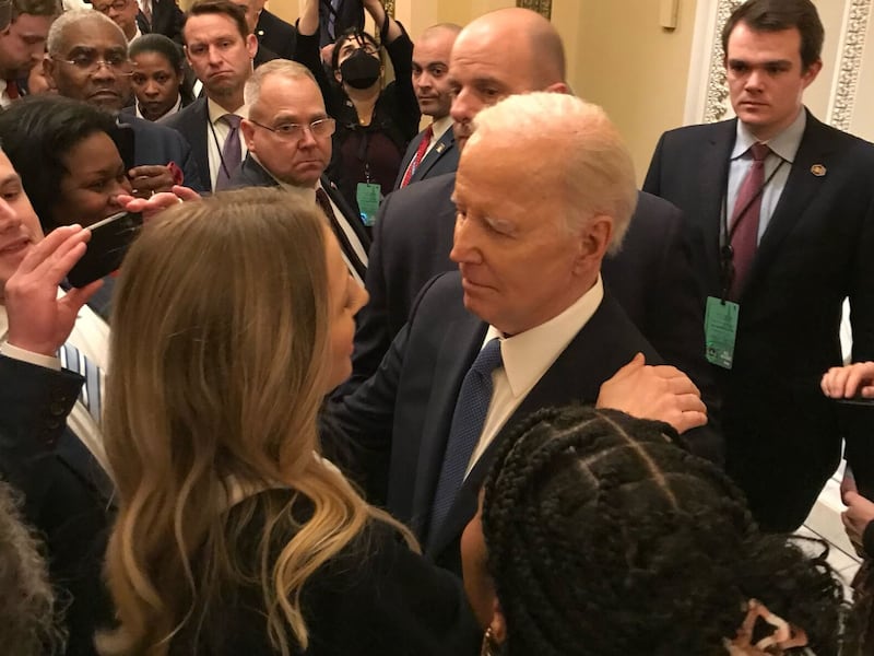 Brittany Alkonis embraces President Joe Biden after the State of the Union at the U.S. Capitol on Feb. 7, 2023.