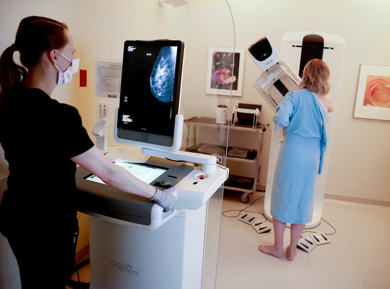 A patient gets a mammogram.