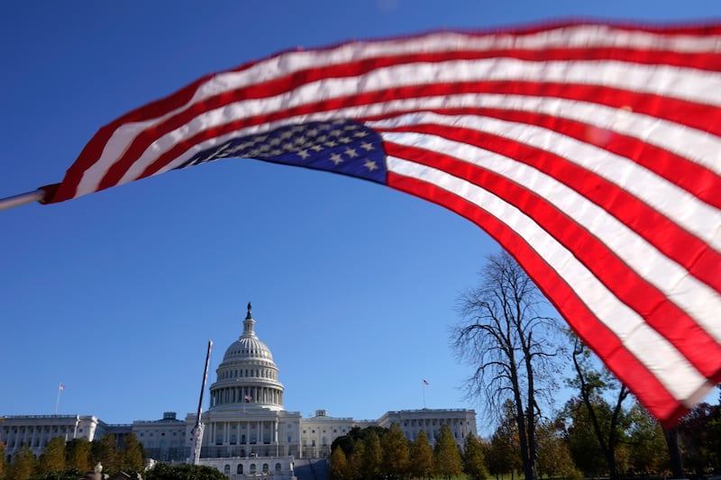 An American flag flies over Capitol Hill in Washington D.C.