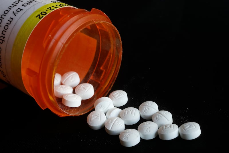FILE - This Aug. 29, 2018 photo shows an arrangement of prescription Oxycodone pills in New York. In a report released on Thursday, Jan. 17, 2019, health officials are looking into a possible link between prescription opioids and a birth defect called gas